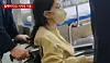Kim Keon Hee, wife of former President Yoon Suk Yeol, is escorted out of Seoul Asan Medical Center in a wheelchair on June 27, 11 days after being hospitalized for treatment of depression and panic disorder, in this screen capture of a video from YTN. [SCREEN CAPTURE]