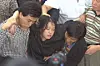 Police drag Jeon Hyeon-ju, the kidnapper and killer of Park Na-ri, 8, to Seocho Police Station in southern Seoul on Sept. 12, 1997.[JOONANG ILBO]