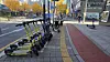 Electric scooters are neatly lined up at a designated parking zone for personal mobility devices in Dujeong-dong, Cheonan, South Chungcheong, on Nov. 11. The city has established 450 such parking zones across urban areas. [SHIN JIN-HO]