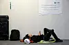 A man lies on the floor at Joaquin Sorolla train station, as a power outage hit large parts of Spain, in Valencia, Spain, April 28. [REUTERS/YONHAP]
