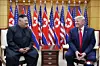 North Korean leader Kim Jong-un and U.S. President Donald Trump met at Panmunjom on June 30, 2019, according to a report by the North Korea's Korean Central News Agency on July 1. The photo, released on the agency’s website, shows the two leaders smiling during a conversation in the VIP lounge of the Freedom House on the South Korean side of Panmunjom. [YONHAP]