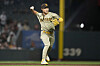 San Diego Padres third baseman Kim Ha-seong throws out San Francisco Giants' Patrick Bailey at first base during the second inning of a game in San Francisco on Sept. 25.  [AP/YONHAP]