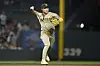San Diego Padres third baseman Kim Ha-seong throws out San Francisco Giants' Patrick Bailey at first base during the second inning of a game in San Francisco on Sept. 25. [AP/YONHAP]