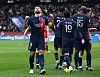 Paris Saint-Germain's Goncalo Ramos celebrates scoring against Reims in Paris on Sunday with Lee Kang-in wearing a hangul shirt visible next to him. [REUTERS/YONHAP]