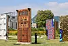 Different building facade ideas proposed by various people are installed at the Songhyun Green Plaza in Jongno District, central Seoul on Sept. 26, as part of the 5th Seoul Biennale of Architecture and Urbanism. [YONHAP]