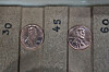 Two of the last five pennies pressed at the U.S. Mint are presented during a news conference in Philadelphia on Nov. 12. [AP/YONHAP]