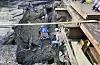 Busan officials investigate the sinkhole site in Gamjeon-dong in Sasang District, Busan, on April 14. [SASANG DISTRICT OFFICE]