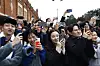 Fans wait for Tottenham Hotspur players to arrive at the stadium before a match against Fulham at Craven Cottage in London on March 16. [REUTERS/YONHAP]