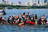 Seoul City Mayor Oh Se-hoon, middle, pose with the participants in the 2024 My Pace Triathlon Festival in the Han River around Songpa District, southern Seoul [NEWS1]