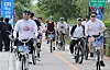 Participants in the 2024 My Pace Triathlon Festival cycle at the Ttukkseom Hangang Park in Gwangjin District, eastern Seoul [NEWS1]