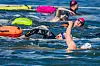 Participants in the 2024 My Pace Triathlon Festival swim in the Han River around Songpa District, southern Seoul [NEWS1]