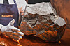 A Martian meteorite, weighing 54.388 pounds, said to be the largest piece of Mars on Earth, pictured at Sotheby's in New York on July 9, was sold for just over $5 million at an auction of rare geological and archaeological objects on July 16. [AP/YONHAP]
