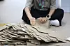 National Election Commission staff check through the presidential election ballots on May 30 in central Seoul. [YONHAP]