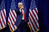 U.S. President Donald Trump points to the crowd as he walks off stage after speaking to House Republican lawmakers during their annual policy retreat on Jan. 6 in Washington. [AP/YONHAP]
