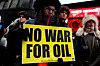 People demonstrate against U.S. military action in Venezuela in Times Square on Jan. 3 in New York. [AFP/YONHAP]