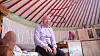 Byambasuren Davaajav, 65, a dairy farmer in Ulaabaatar's Jargalant, speaks with reporters inside his ger (tent) on April 15. [GLOBAL CIVIC SHARING]