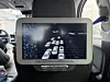 The rear-seat display shows vehicles, pedestrians, and obstacles as intuitive icons. [SARAH CHEA]