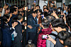 Democratic Party leader Lee Jae-myung is surrounded by DP lawmakers and supporters on Wednesday morning as he walks out of the Seoul Detention Center in Gyeonggi. [YONHAP]