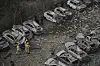 Firefighters inspect the site struck by an Iranian missile strike that killed several people, in Beersheba, Israel, on Tuesday, June 24, 2025. [AP/YONHAP]
