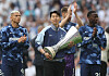 Son Heung-min of Tottenham holds the UEFA Europa League winners trophy during a lap of honour after the English Premier League match between Tottenham Hotspur and Brighton in London on May 25. [EPA/YONHAP]