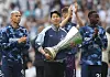 Son Heung-min of Tottenham holds the UEFA Europa League winners trophy during a lap of honour after the English Premier League match between Tottenham Hotspur and Brighton in London on May 25. [EPA/YONHAP]