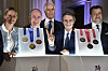 From left, former Italian swimmer Federica Pellegrini, Veneto region President Luca Zaia, Milano Cortina 2026 Foundation President Giovanni Malago, Lombardy region President Attilio Fontana and Italy's vice Premier Matteo Salvini pose for photographers next to Milano Cortina 2026 Winter Olympics and Paralympics medals during the unveiling ceremony in Venice, Italy, on July 15 [AP/YONHAP]