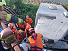 A 1-ton mobile bathing vehicle that plunged down a riverside embankment after colliding with a 1-ton truck in Mokdo-ri, Hadong-eup, Hadong County, at around 8:35 a.m. on Oct. 16. [SOUTH GYEONGSANG FIRE DEPARTMENT]
