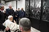 Pope Francis waves at inmates behind a closed gate during his visit to the Regina Coeli penitentiary in Rome on Holy Thursday on April 17. [AP/YONHAP]