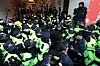 Members of the Korean Confederation of Trade Unions (KCTU) walk toward their office in central Seoul after the police raid the building on Jan. 18, 2023. [NEWS1]