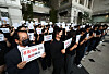 Financial Supervisory Service (FSS) employees hold a protest in front of the FSS headquarters in Yeouido, western Seoul on Sept. 9. [NEWS1]