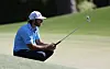 Max Homa lines up a putt on the eighth hole on the final day of the Masters Tournament at Augusta National Golf Club in Augusta, Georgia on April 14. [YONHAP]