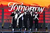 Members of boy band Tomorrow X Together pose for photos during a showcase held on Monday at the Hwajeong Gymnasium in Korea University, central Seoul, for the release of the band's sixth EP 'minisode 3: Tomorrow.' [BIGHIT MUSIC]