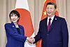 Chinese President Xi Jinping, right, and Japanese Prime Minister Sanae Takaichi shake hands during their summit on the sidelines of the APEC Economic Leaders' Meeting in Gyeongju on Oct. 31, 2025. [YONHAP]