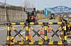 Residents of Tongilchon, a village inside the civilian control zone, cross Tongil Bridge driving tractors to stage a protest against the Families of Abductees to North Korea Association’s attempt to launch anti-North Korea leaflets at Imjingak in Paju, Gyeonggi, on April 23. [YONHAP]