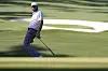 Scottie Scheffler reacts after missing a putt on the 10th hole during the third round at the Masters golf tournament at Augusta National Golf Club on April 13 in Augusta, Georgia. [AP/YONHAP]
