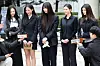 NewJeans members respond to questions from the local press at Seoul Central District Court in Seocho District, southern Seoul, on March 7. [NEWS1]