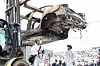 The burnt Mercedes EQE sedan is transferred for investigation in Incheon on Thursday. The EV explosion injured 23 people and damaged around 880 vehicles in the parking garage. Some 500 households have suffered from electricity outrages for a week. [YONHAP]