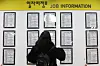 A jobseeker looks at notices at a welfare center in western Seoul on March 17. [YONHAP]