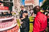 Visitors at a sauce exchange event hosted by Samyang Roundsquare, where customers can taste new sauces of the Buldak spicy noodle brand, are seen at a booth in New York City on Oct. 21, 2024. [SAMYANG ROUNDSQUARE]