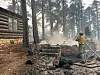 This photo provided by National Park Service shows the charred remains of a building at the North Rim of Grand Canyon National Park, in northern Arizona, July 13. [AP/YONHAP]