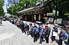 Senior citizens wait in line for their free meal near Tapgol Park in central Seoul on May 12. [NEWS1]