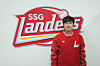 SSG Landers third baseman Choi Jeong poses in front of the team's logo at Incheon SSG Landers Field in Incheon after signing a free agent contract with the club on Nov. 6. [YONHAP]