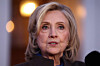 Former U.S. Secretary of State Hillary Clinton speaks to the press after her deposition with the House Oversight Committee as they investigate links to convicted sex offender Jeffrey Epstein, in Chappaqua, New York, on Feb. 26. [AFP/YONHAP]