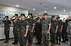 Soldiers from the Korea Armed Forces Athletic Corps (Kafac), including 17 players from K League 1 team Gimcheon Sangmu, salute during a discharge ceremony at the Kafac headquarters in Mungyeong, North Gyeongsang on Monday. The discharged football players will now return to their former clubs. [GIMCHEON SANGMU]