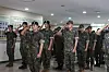 Soldiers from the Korea Armed Forces Athletic Corps (Kafac), including 17 players from K League 1 team Gimcheon Sangmu, salute during a discharge ceremony at the Kafac headquarters in Mungyeong, North Gyeongsang on Monday. The discharged football players will now return to their former clubs. [GIMCHEON SANGMU]