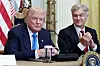 U.S. President Donald Trump, left, sits at a health technology event in the East Room at the White House in Washington on July 30. [REUTERS/YONHAP]