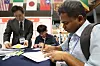 An international student fills out an application at a job fair for international students in Gyeongsan, North Gyeongsang, on Aug. 28. [NEWS1]