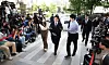 HYBE Chairman Bang Si-hyuk, center, appears at the Financial Crimes Investigation Division of the Seoul Metropolitan Police Agency in western Seoul on Sept. 15. [YONHAP]