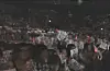 Fans of Girls’ Generation hold up paper signs reading “We missed you” during the group’s concert in Seoul in 2011. [SCREEN CAPTURE]