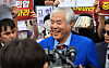Jeon Kwang-hoon of the Sarang Jeil Church speaks in front of his church in Seongbuk District, central Seoul, during a police raid on Aug. 5. [YONHAP]